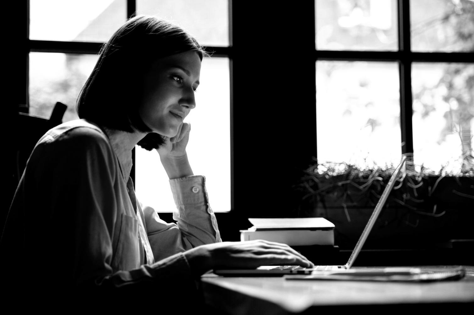 Financial education workshop in progress with participants working on their personal budgets